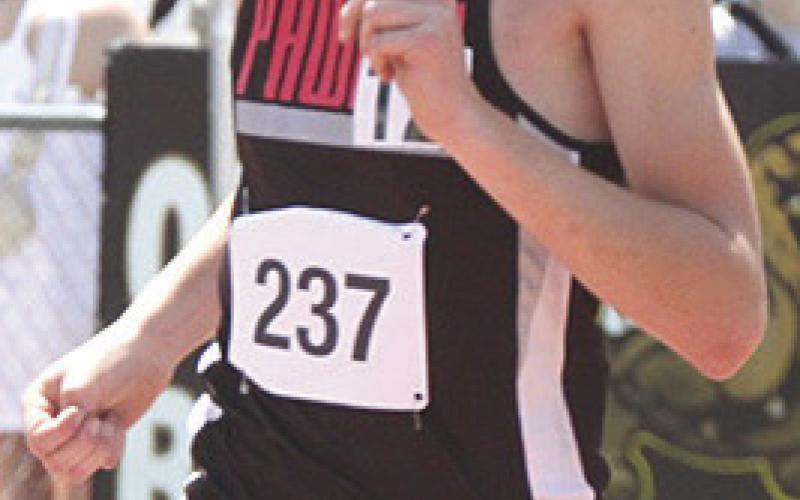 P.C.’s Drew Menninga keeps his pace in the Class D boys’ 800 M. Run. Photo by Stephanie Croston/ Seward Independent