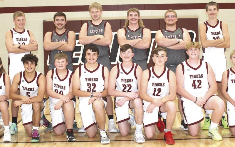Members of the 2023-24 Lewiston Boys’ Basketball Team are front, from left: Cashton Steinacher, Alex Seeman, Taven Borcher, Axel Seeman, Cooper Swendener, Tristan Wagner, Brody Wright, Evan Christen. Back row: Everett Bohling, Brady Bledsaw, Caleb Rule, Tristen Ray, Jaxon Janssen, Ashton Sanders. Not pictured: Head Coach Kyle Asche and Asst. Coach Treyton Hippen.