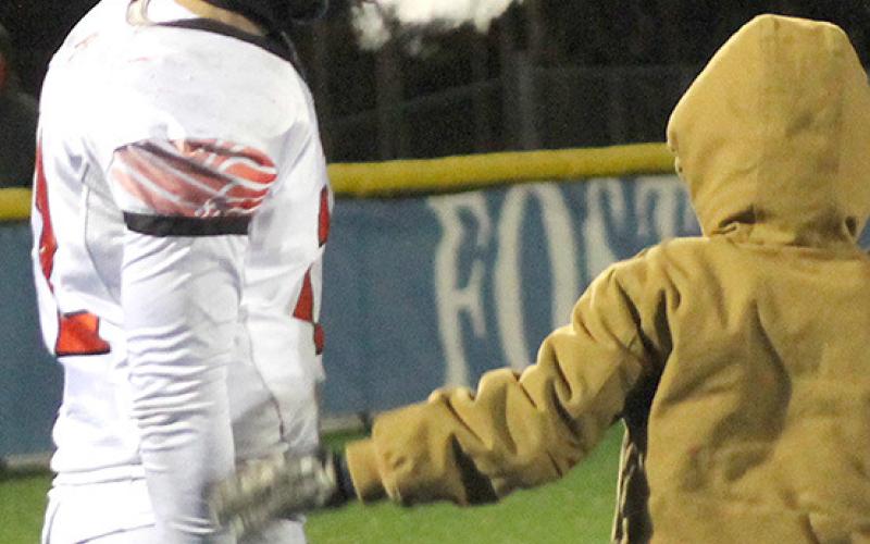 IT WAS THAT COLD – Pawnee City’s Andy Maloley’s breath (left) shows you just how cold it was at the Class D6 State Football Championships. Paula Jasa/Republican