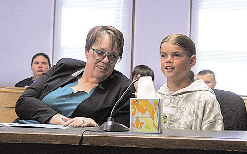 HTRS fifth grader Emory delivers the closing statement for the defense alongside her co-counsel, Diane Merwin