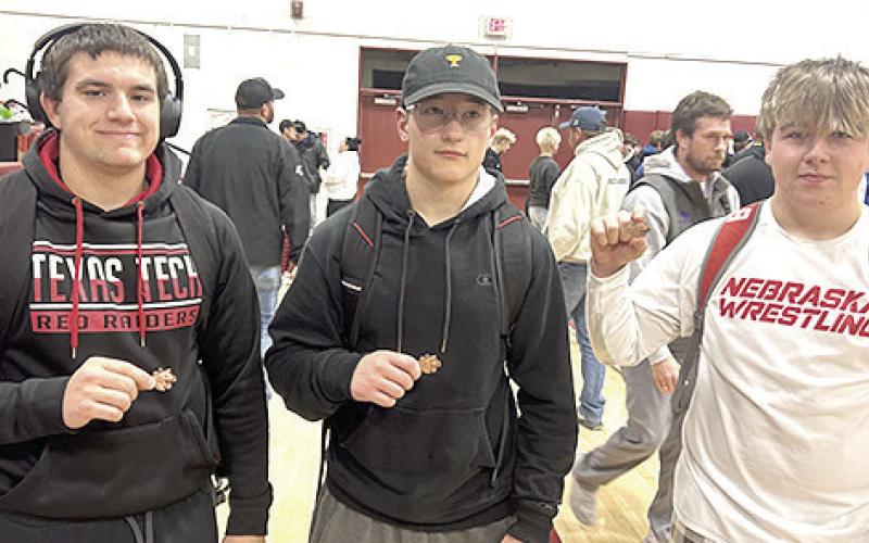 Pictured are Pawnee City wrestlers who claimed 3rd place medals in their respective divisions at the Conestoga Classic on Saturday. From left are: Dylan Layne, Jesse McLaughlin and Gauge Shuetz. Photo courtesy of Jamie Maloley