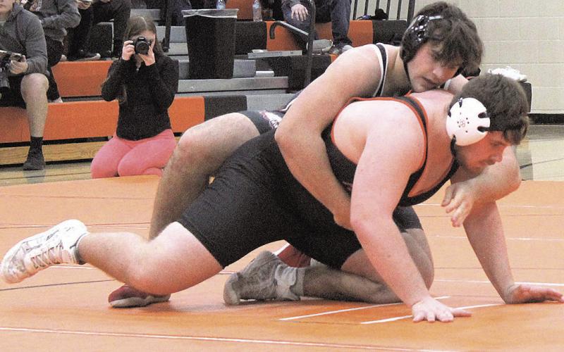 Pawnee City Indian Dylan Layne resets to go another round against Falls City Tiger Chase Simpson