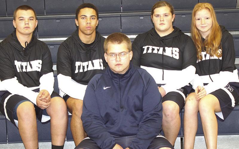 Members of the 2024-25 HTRS Wrestling Team are front row, River McNeely. Back row, from left: Justin Hoagland, Alex Dewberry, Ava Grimes, Shawnna Richey. Not pictured: Alyssa Askren.