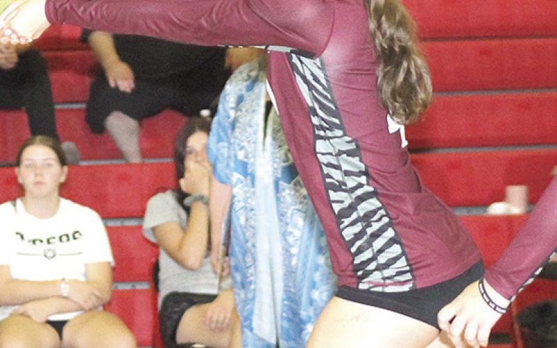 LHS’ Savannah Cutshall passes the ball to the front row on serve receive against Pawnee City. Paula Jasa/Republican