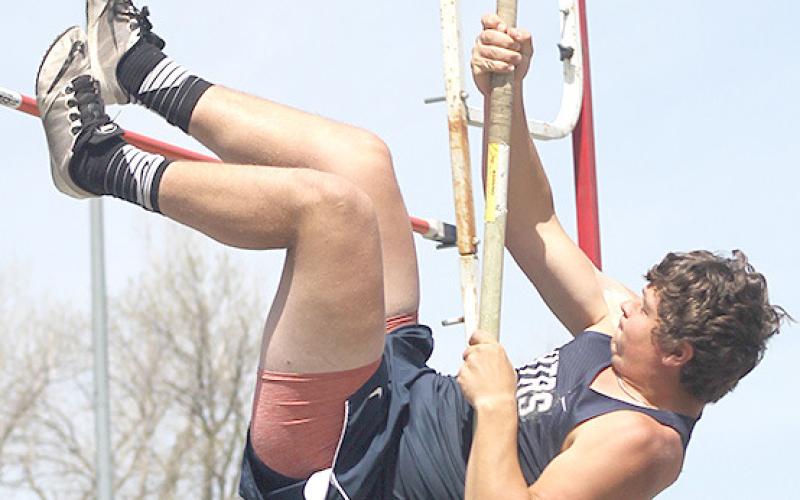 HTRS’ Hunter Bohling gives a leg up in the Pole Vault event. Bohling placed 3rd at 10’6”. Paula Jasa/Republican