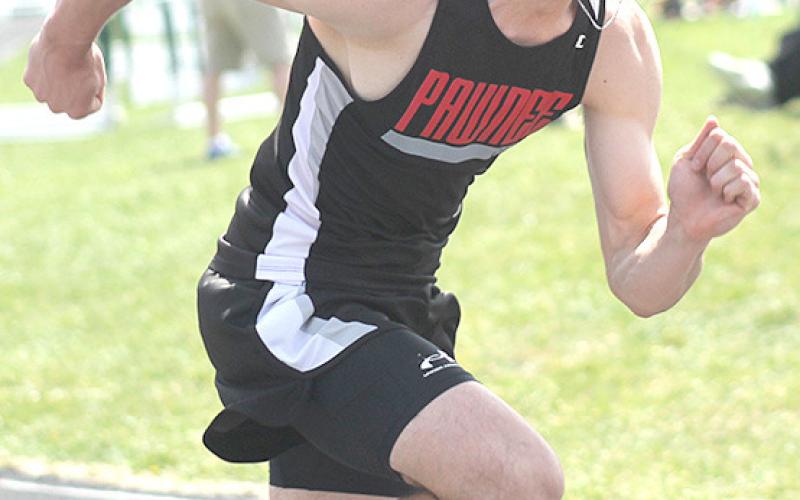 P.C.’s Jett Farwell gets out of the blocks quickly in the 400 M. Dash. Farwell won both the 400 and 800 M. events with times of 52.87 and 2:06.14. Paula Jasa/Republican