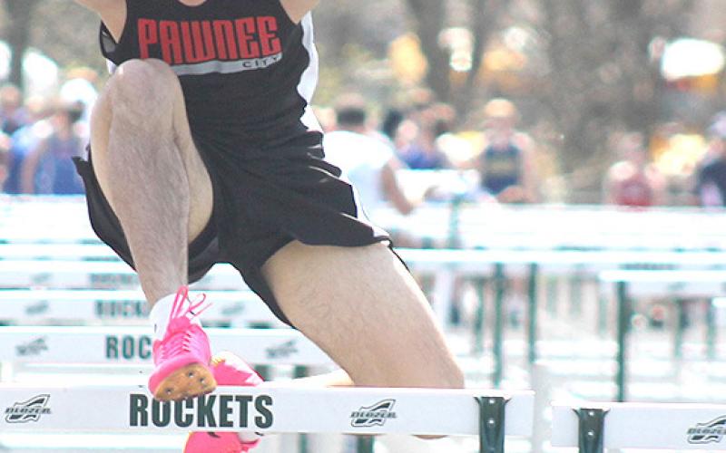Paula Jasa/Republican P.C.’s Anthony Kling clears his final hurdle of the 110 M. boys’ prelims at the Irish Invitational. Kling finished just out of qualifying for finals at 20.75, but placed 3rd in the 300 M. Hurdle event at 47.03.