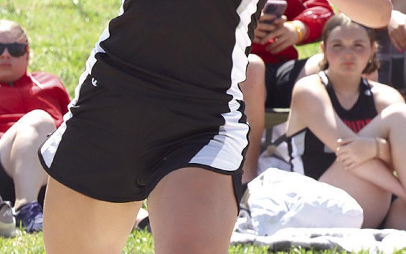 Pawnee City’s Cameron Ottersberg prepares to heave her throw in the Class D-1 Girls’ Shot Put event.