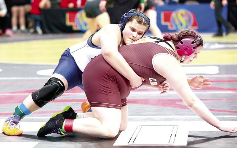 Photo courtesy of Lorrie Novak HTRS’ Ava Grimes (on top) at the start of the 2nd period in her Consolation match against Allee Jo Inzauro of Conestoga. Ava pinned her in 2:52.