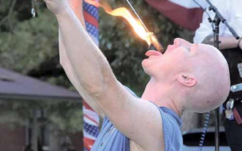 Performers from Drops Unlimited from the Kansas City area, gave a show at the Table Rock Fair Saturday. They used fire and other lighting props like LED to thrill the crowd. Ray Kappel/Republican
