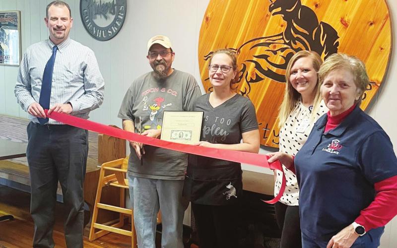 The Chamber of Commerce held a ribbon cutting ceremony for the Blazin Bull last Tuesday. From left are Chamber President Brian Rottinghaus, owners Tony Moore and Tina Moore, Katrina Olberding from the hospital/clinic and Lola Seitz with the chamber. Ray Kappel/Republican