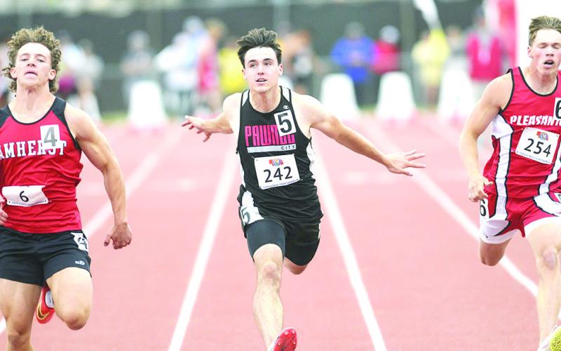 Pawnee City’s Jett Farwell (center) crosses the line quickly in the Class D boys’ 100 M. Dash prelims on Friday. Photo courtesy of Luke Nichols/Beatrice Daily Sun