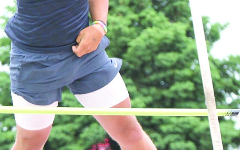 HTRS’ Hunter Bohling (above, left) cleared 12’6” in the Class D boys’ Pole Vault on Saturday for 9th place overall while Pawnee City’s Jesse McLauglin (above, right) got off to a quick start in the Class D boys’ 400 M. Relay on Saturday. Pawnee City made the podium with their 7th place time of 44.65. Photos courtesy of Stephanie Croston/Seward County Independent