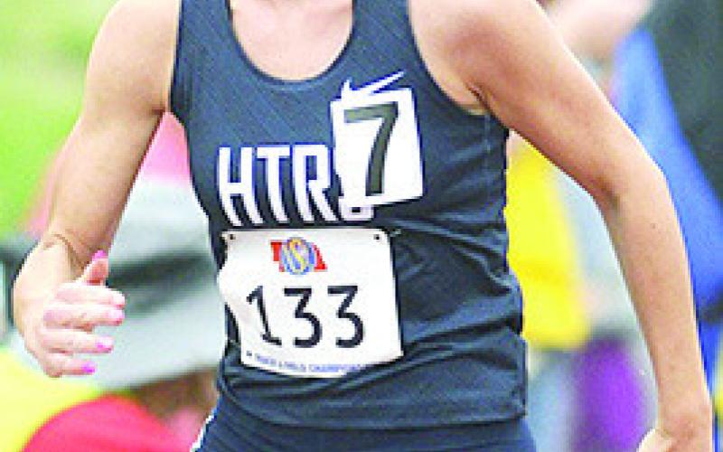 HTRS’ Lillian Bowen comes around the corner of the Class D girls’ 400 M. Dash on Friday. Lillian also ran in the 800 M. Run on Saturday and placed 6th with her new school record time of 2:26.80. Photo courtesy of Luke Nichols/ Beatrice Daily Sun
