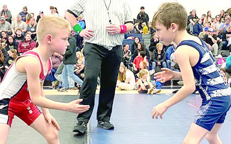 They recently hosted their tournament with 226 wrestlers in attendance. Pictured right is HTRS’ Talon Wamsley (right) in one of his matches. He took 1st place in one of the the 1st2nd grade divisions. See below for all of the details.