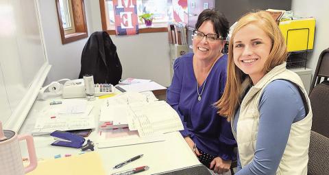Crunching the numbers - Auditors Julie Bauman (left) and Lydia Bauman are in the city office working on the annual Pawnee city audit