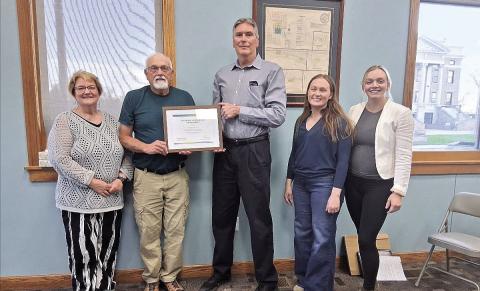 From left to right: City Clerk Tammy Curtis, Mayor Charlie Hatfield, Dave Honz, Economic Development Co Directors Josie Friedly and Jess Colo