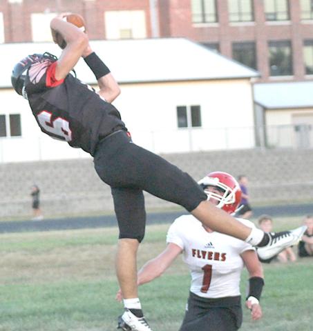 Pawnee City opened up the 2022 season with an easy 48-7 win over the Franklin Flyers on Thursday night. Anthony Kling (#16, left) made this awesome TD catch right before halftime and then kicked the PAT to put P.C. up 32-0. See page 5-6 for all of the details.