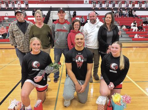 Seniors recognized (left to right) Madelyn Osborne, Atreyu Kling, Abby Dietrich, not pictured Tyler Tegtmeier. photo by Anne Veleba