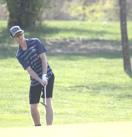 HTRS/P.C.’s Justin Pierce watches as he chips his shot into the hole on the #4 green last Thursday at the JCC Invitational. Paula Jasa/Republican