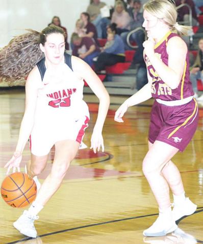 P.C.’s Madison Lytle (#23, left) drives the lane against Sterling in last Friday night’s matchup. Paula Jasa/Republican