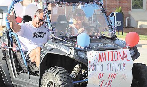 Sgt. Shane Maloley, the Steinauer Parade Grand Marshal, was named the National Law Enforcement of the Year by the American Legion. Evelyn Fink riding her tricycle in the parade.