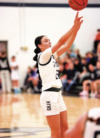 HTRS Titan Lillian Bowen outside arc. Bowen made 3 treys in all, 11 points in all. The team had 6 treys.