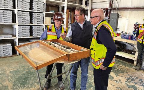 NioCorp executives Scott Homan (left) and Mark Smith (right) showcase rare earth samples to Congressman Adrian Smith (center).