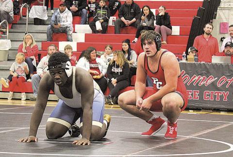 Pawnee City Indian Dylan Layne and Lincoln Lutheran Warrior Josiah Nsoh await the go-ahead from the referee to begin another round.