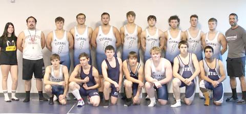 Members of the 2021-22 HTRS Wrestling Team are front, from left: Roman Coats, Caleb Werman, Isaac Thompson, Jesse McLaughlin, Clayton Howe, Zachary Hedden, Yadriel Cartagena. Back row: Ricky Long, s.m., Coach Koalton Taiclet, Aiden Worthey, Isaac Bittner, Ty Faulks, Brandt Leach, Devin Zermeno, Marcus Bratrsovsky, Andy Maloley, Clayton Shook, Coach Shane Maloley.