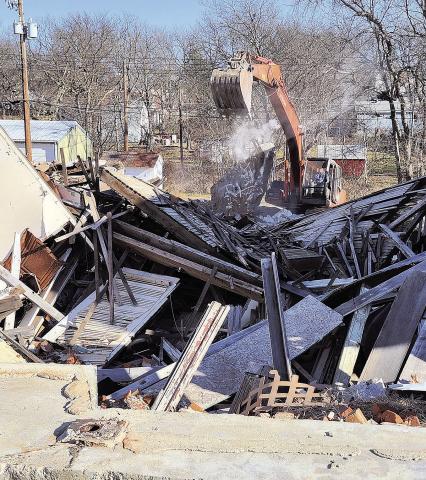 Inline Construction has begun demolition and cleanup of the collapsed buildings on G Street