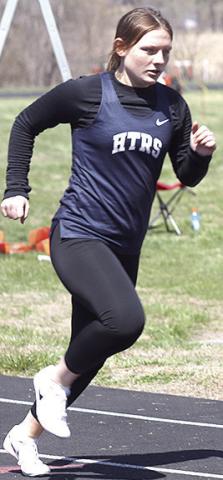 HTRS’ Maddie Bredemeier strides out in the girls’ 400 M. Dash. Paula Jasa/Republican
