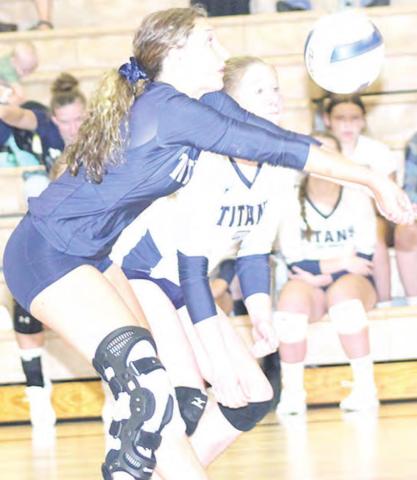 HTRS’ Ellie Schaardt passes the ball up to her setter in Tuesday’s game against Lewiston. Paula Jasa/Republican