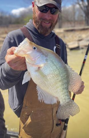 Joe Norman with a fish he caught