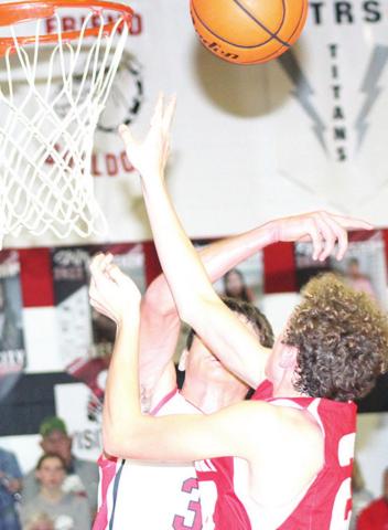 P.C.’s Bryce Gyhra gets a big block against Frankfort in Friday night action Paula Jasa/Republican