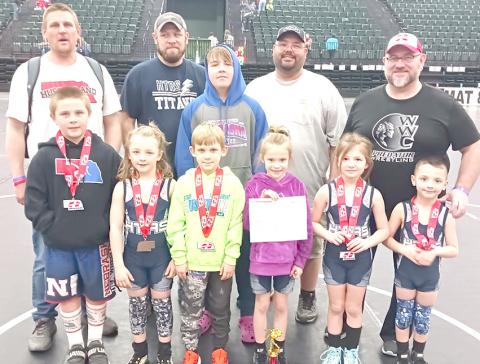 Pictured are front row, from left: Parker Schuetz, Mason Ellston, Gus Glathar, Everlynn Kreifel, Gemma Thompson, Laiken Ellston. Back row from left: Head Coach Jacob Schuetz, Trent Glathar, Gauge Schuetz, Cole Ellston, Coach Cory Thompson.