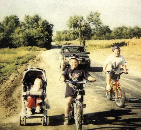 The photo Tammy staged with her children. She credits this photo for earning Pawnee City the grant to build the Dr. Rick Jackson trail Photo courtesy of Tammy Curtis