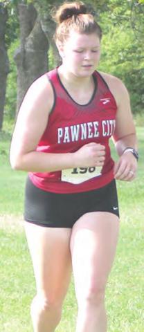 P.C.’s Kenadie Schmutz (right) competes at the JCC Invitational.