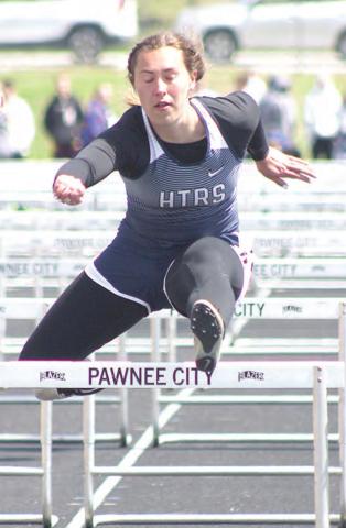 HTRS’ Natalie Novak clears her final hurdles of the 100 M. event and places 2nd at 17.94. Paula Jasa/Republican