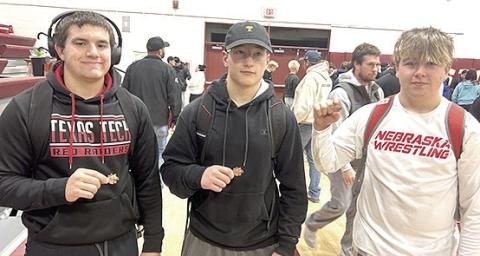 Pictured are Pawnee City wrestlers who claimed 3rd place medals in their respective divisions at the Conestoga Classic on Saturday. From left are: Dylan Layne, Jesse McLaughlin and Gauge Shuetz. Photo courtesy of Jamie Maloley