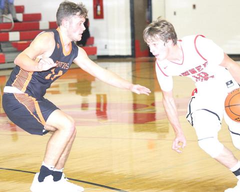 P.C’s Kyle Gyhra (#10, right) takes off down the lane against a Diller/Odell defender. The Indians struggled on offense in their home opener and lost 14-51. Paula Jasa/Republican