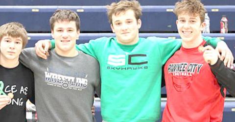 Four HTRS/P.C. Wrestlers medaled at the Cross County Meet held on Saturday, January 16th where the Titans faced some tough competition. Twenty teams were represented at the meet and after a long day of wrestling, the four members of the HTRS/PC team who medaled were from left, Jakob Richey, 6th place; Aiden Worthey, 3rd place; Isaac Bitner, 4th place and Andy Maloley, 4th place. photo provided