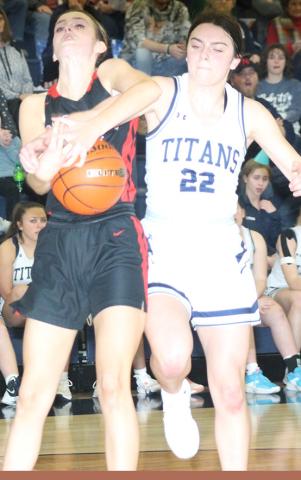 P.C.’s Mallory Branek (left) battles HTRS’ Lillian Bowen (#22, right) for a rebound. Paula Jasa/Republican