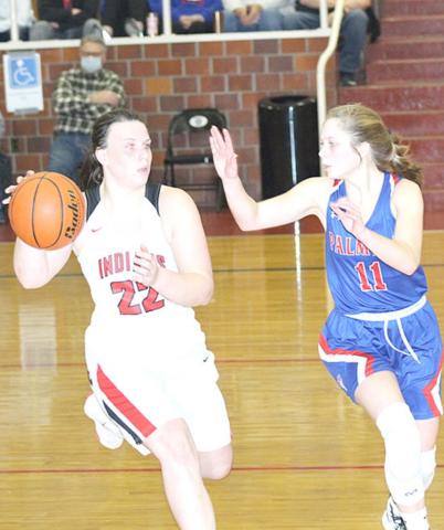 P.C.’s Austin Branch #22, left) brings the ball down the floor against Palmyra in the 3rd place game. Paula Jasa/Republican