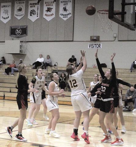 Sterling Jet Vivienne Johnson shoots a basket