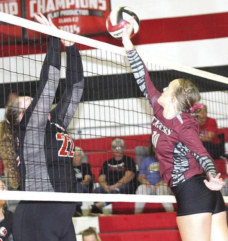 Pawnee City’s Adelyn Sisco (#22, left) and Lewiston’s Jenna Anderson (#10, right) go head to head at the net. Paula Jasa/Republican