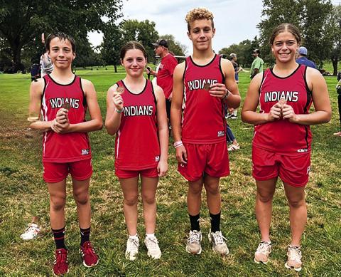 Pawnee City Cross Country Junior High Medal Winners (from left) Alex Hall, Lisa Holthus, Tim Hoffman and Alana Gyhra