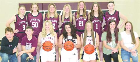 Members of the 2024-25 Lewiston Girls’ Basketball Team are from left: Corbin Crouse, s.m., Owen Wehrbein, s.m., DeLanye Currie, Natasha Ellis, Jenna Anderson, Brooklyn Eggert, s.m., Izzy Meyers, s.m. Back row: Ayden Hunzeker, Vivienne Johnsen, Bryleigh Crouse, Justice Currie, Maddie Janssen, Savannah Cutshall, Sara Wiles. Not pictured: Coaches Allison Nissen and Tracie Wehrbein.