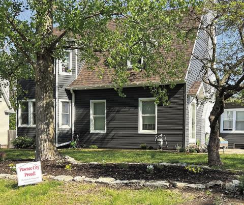 The first home to receive a Pawnee City Proud sign this summer, is the home of Russ and Kate Weeks. The Weeks family has spent hours remodeling their home, putting up a new garage building, and landscaping their yard! It all looks wonderful! Thank you for helping our community look its best!