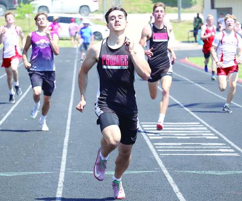 Pawnee City’s Jett Farwell (center) finishes hard in the Class D-1 boys’ 400 M. Dash while teammate Drew Menninga (right) finishes 2nd to qualify for State. Jasa/Republican